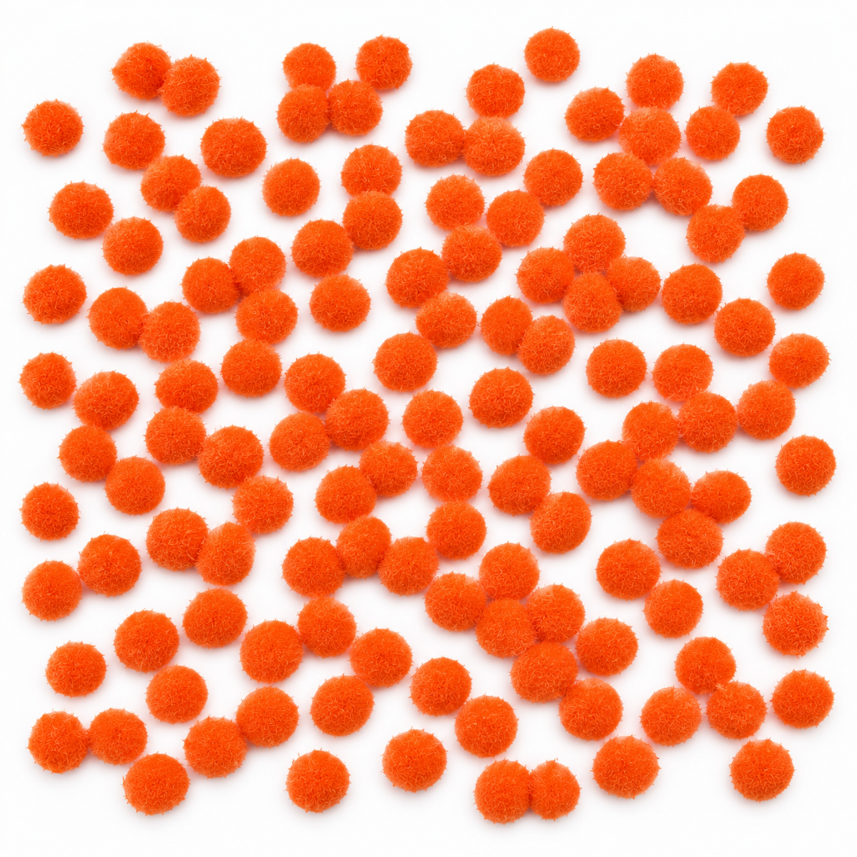 Fluffy orange pom-poms at Craft Vault